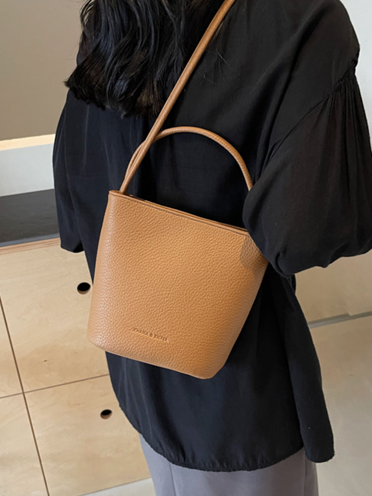 2025 Korean Style Handheld Water Bucket Bag for Women - Minimalist Casual Shoulder Bag with Trendy Versatile Design 2025 Korean Style Handheld Water Bucket Bag for Women - Minimalist Casual Shoulder Bag with Trendy Versatile Design