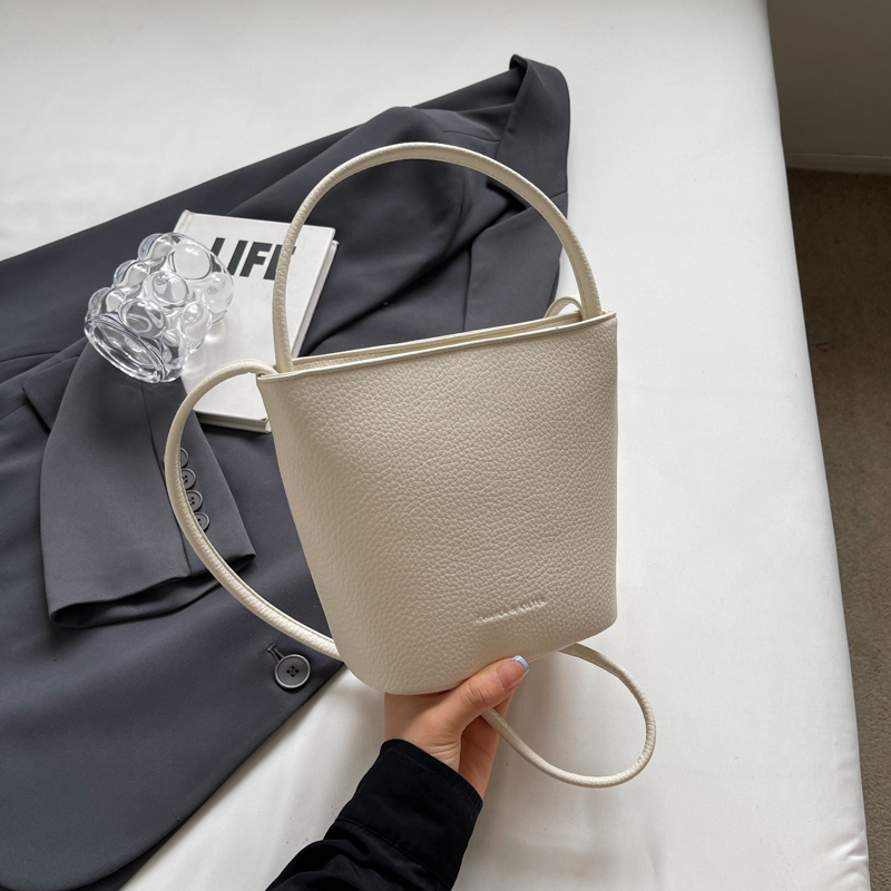 2025 Korean Style Handheld Water Bucket Bag for Women - Minimalist Casual Shoulder Bag with Trendy Versatile Design 2025 Korean Style Handheld Water Bucket Bag for Women - Minimalist Casual Shoulder Bag with Trendy Versatile Design