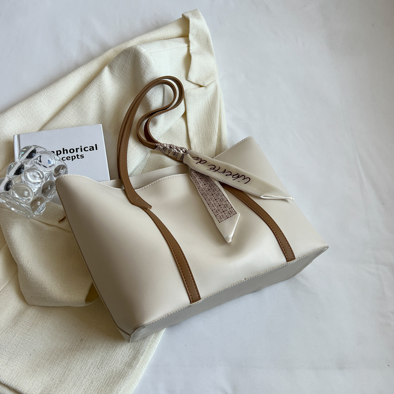 2025 Spring/Summer Women's Minimalist Large Capacity Bucket Bag - Versatile Casual Shoulder Bag for Commuters, Niche Fashion Style 2025 Spring/Summer Women's Minimalist Large Capacity Bucket Bag - Versatile Casual Shoulder Bag for Commuters, Niche Fashion Style