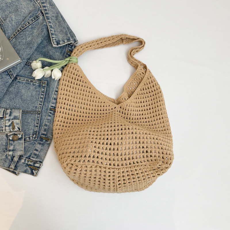 2025 Summer Women's Large Capacity Hollow Woven Beach Bucket Bag - Trendy Simple Design for Coastal Adventures 2025 Summer Women's Large Capacity Hollow Woven Beach Bucket Bag - Trendy Simple Design for Coastal Adventures