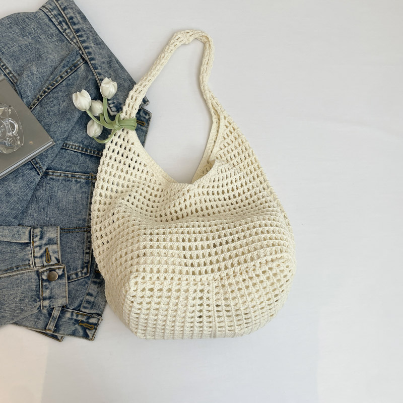 2025 Summer Women's Large Capacity Hollow Woven Beach Bucket Bag - Trendy Simple Design for Coastal Adventures 2025 Summer Women's Large Capacity Hollow Woven Beach Bucket Bag - Trendy Simple Design for Coastal Adventures