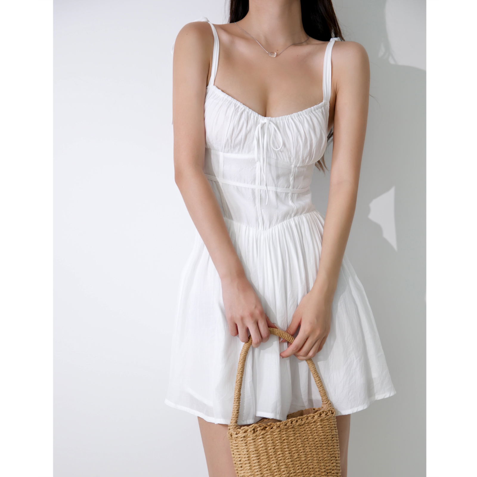 Ethereal White V-Neck Wrap Dress - Spaghetti Strap, Waist-Cinching, Slim Fit Summer Style for a French-Inspired Look Ethereal White V-Neck Wrap Dress - Spaghetti Strap, Waist-Cinching, Slim Fit Summer Style for a French-Inspired Look