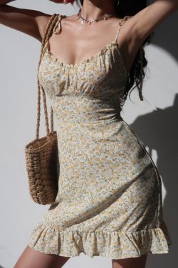 French-Style Yellow Floral V-Neck Tie Strap Dress with Waist-Cinching Short Skirt - Playful Vacation Essential