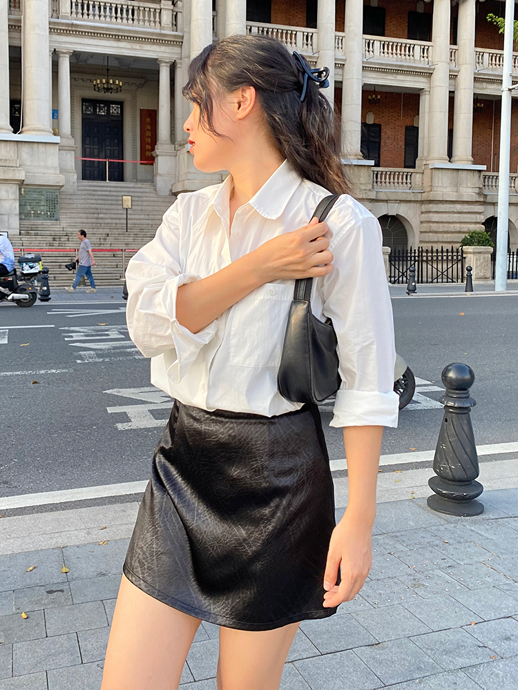 High-Waisted A-Line Skirt with Built-In Safety Shorts - French Retro Slim-Fit Short Skirt for a Chic 90s Style Look High-Waisted A-Line Skirt with Built-In Safety Shorts - French Retro Slim-Fit Short Skirt for a Chic 90s Style Look