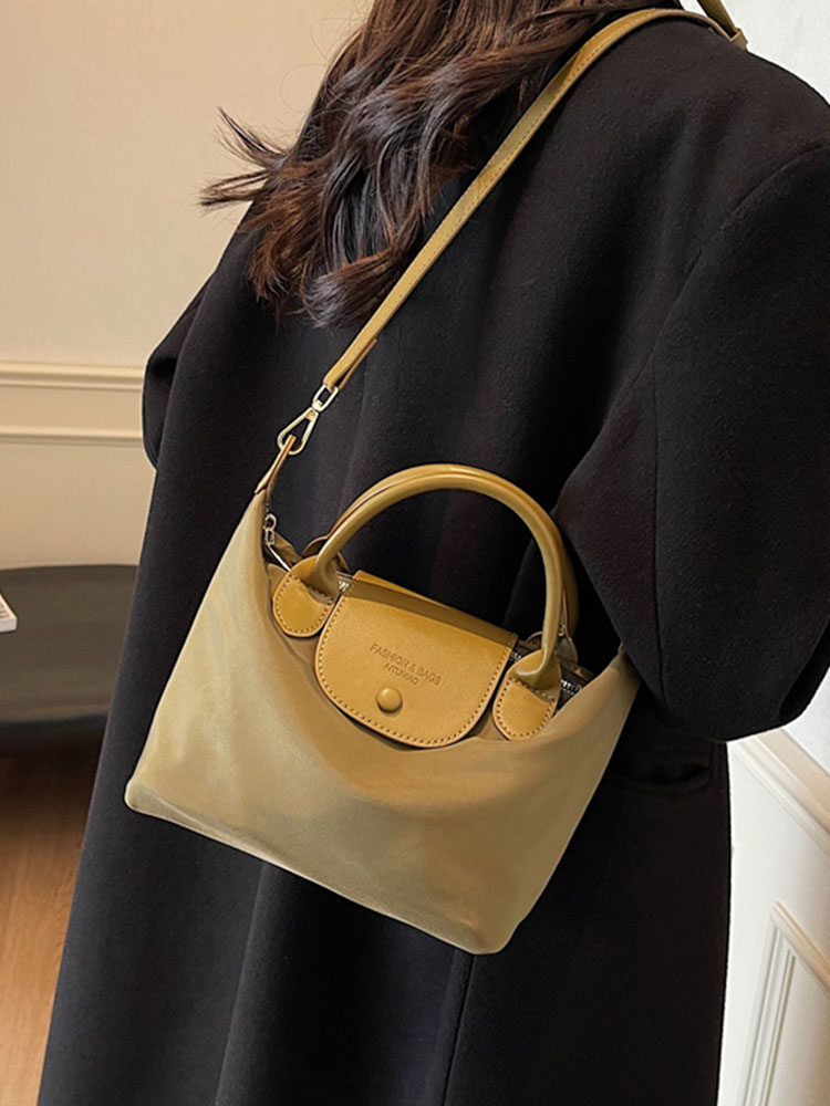 Korean-Style Retro Casual Bucket Bag for Women - Trendy Versatile Handheld Design, High-End Feel, Spring/Summer 2025 Collection Korean-Style Retro Casual Bucket Bag for Women - Trendy Versatile Handheld Design, High-End Feel, Spring/Summer 2025 Collection