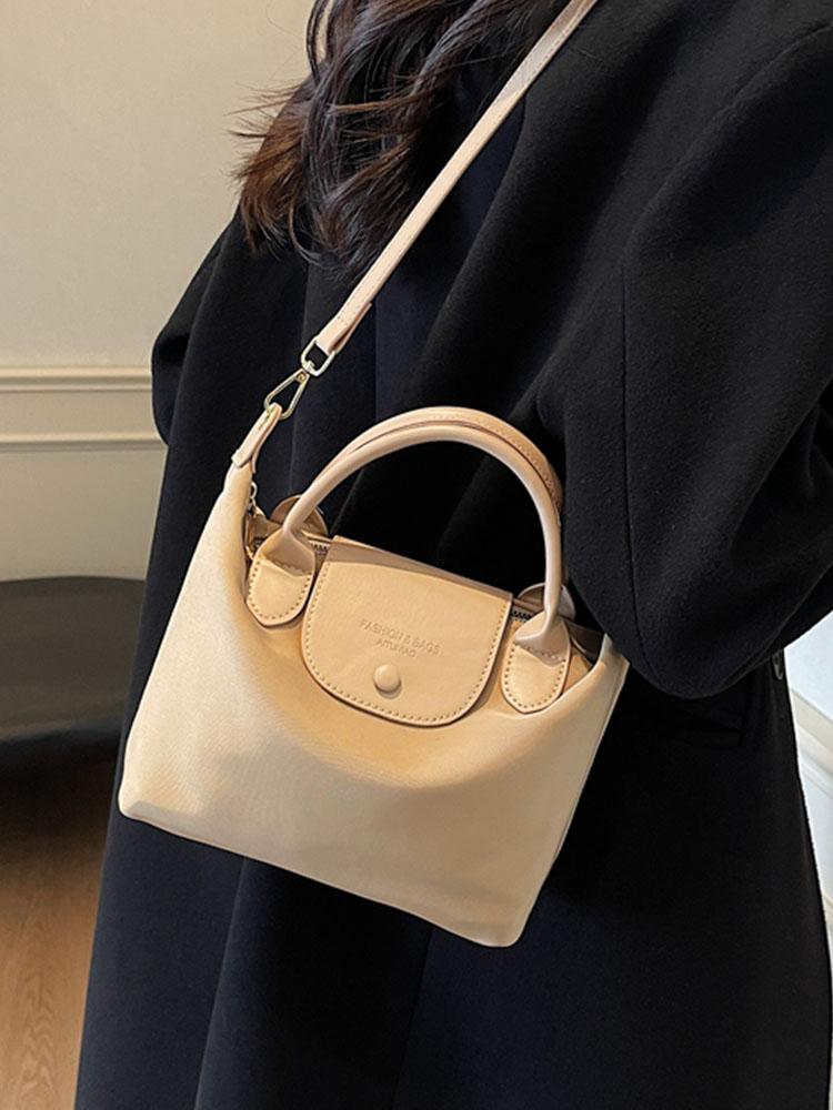 Korean-Style Retro Casual Bucket Bag for Women - Trendy Versatile Handheld Design, High-End Feel, Spring/Summer 2025 Collection Korean-Style Retro Casual Bucket Bag for Women - Trendy Versatile Handheld Design, High-End Feel, Spring/Summer 2025 Collection