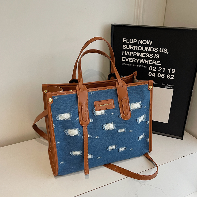 Korean-Style Ripped Denim Tote Bag for Women - Large Capacity Shoulder Crossbody Bag for Commuting - 2025 Fashion Trend Korean-Style Ripped Denim Tote Bag for Women - Large Capacity Shoulder Crossbody Bag for Commuting - 2025 Fashion Trend