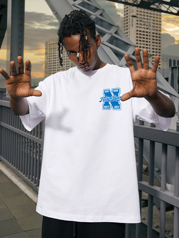 Men's Oversized Short-Sleeve T-Shirt in American Street Style, Plus Size, Summer Fashion, Casual Urban Look Men's Oversized Short-Sleeve T-Shirt in American Street Style, Plus Size, Summer Fashion, Casual Urban Look