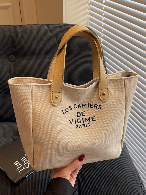 Versatile Handheld Canvas Tote Bag for Women - Large Capacity Summer Commuting Bucket Bag, Perfect for Work and Everyday Use Versatile Handheld Canvas Tote Bag for Women - Large Capacity Summer Commuting Bucket Bag, Perfect for Work and Everyday Use