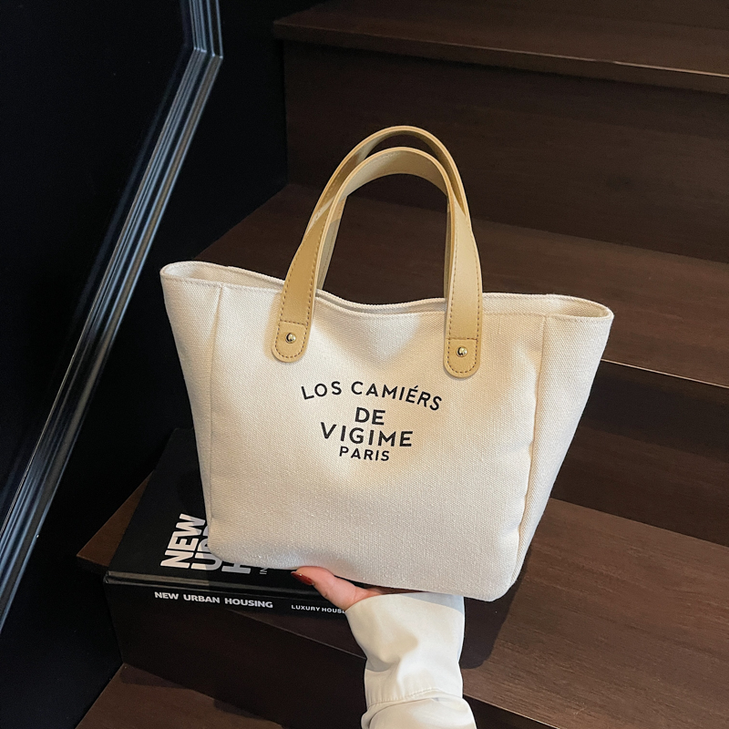 Versatile Handheld Canvas Tote Bag for Women - Large Capacity Summer Commuting Bucket Bag, Perfect for Work and Everyday Use Versatile Handheld Canvas Tote Bag for Women - Large Capacity Summer Commuting Bucket Bag, Perfect for Work and Everyday Use