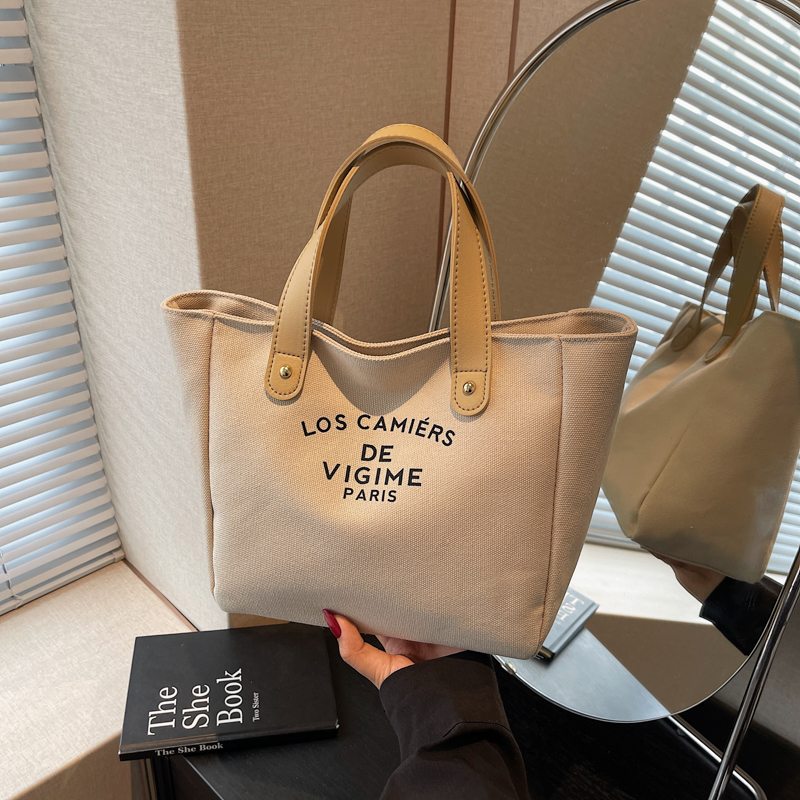 Versatile Handheld Canvas Tote Bag for Women - Large Capacity Summer Commuting Bucket Bag, Perfect for Work and Everyday Use Versatile Handheld Canvas Tote Bag for Women - Large Capacity Summer Commuting Bucket Bag, Perfect for Work and Everyday Use