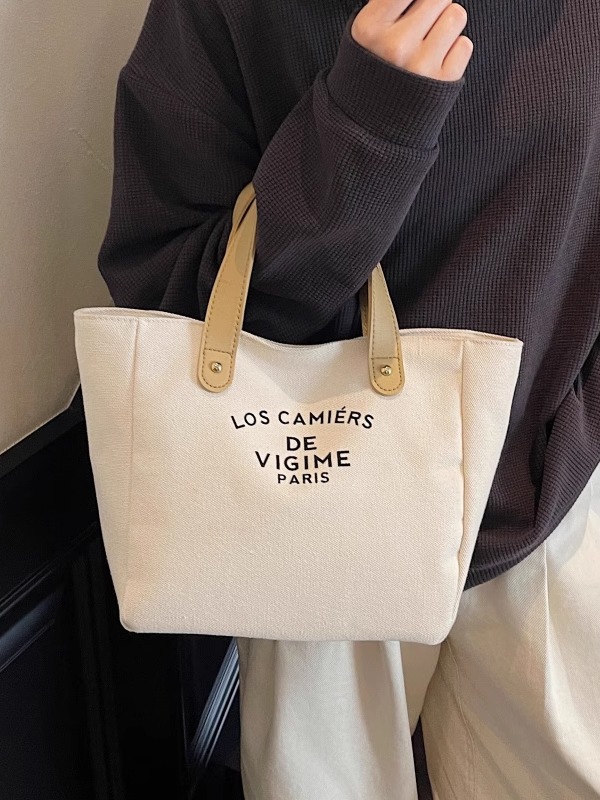 Versatile Handheld Canvas Tote Bag for Women - Large Capacity Summer Commuting Bucket Bag, Perfect for Work and Everyday Use Versatile Handheld Canvas Tote Bag for Women - Large Capacity Summer Commuting Bucket Bag, Perfect for Work and Everyday Use