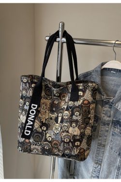 Women’s Niche Cartoon Canvas Tote Bag – Large Capacity Spring 2025 Commuter Shoulder Bag for Students