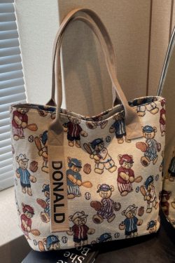 Women’s Niche Cartoon Canvas Tote Bag – Large Capacity Spring 2025 Commuter Shoulder Bag for Students